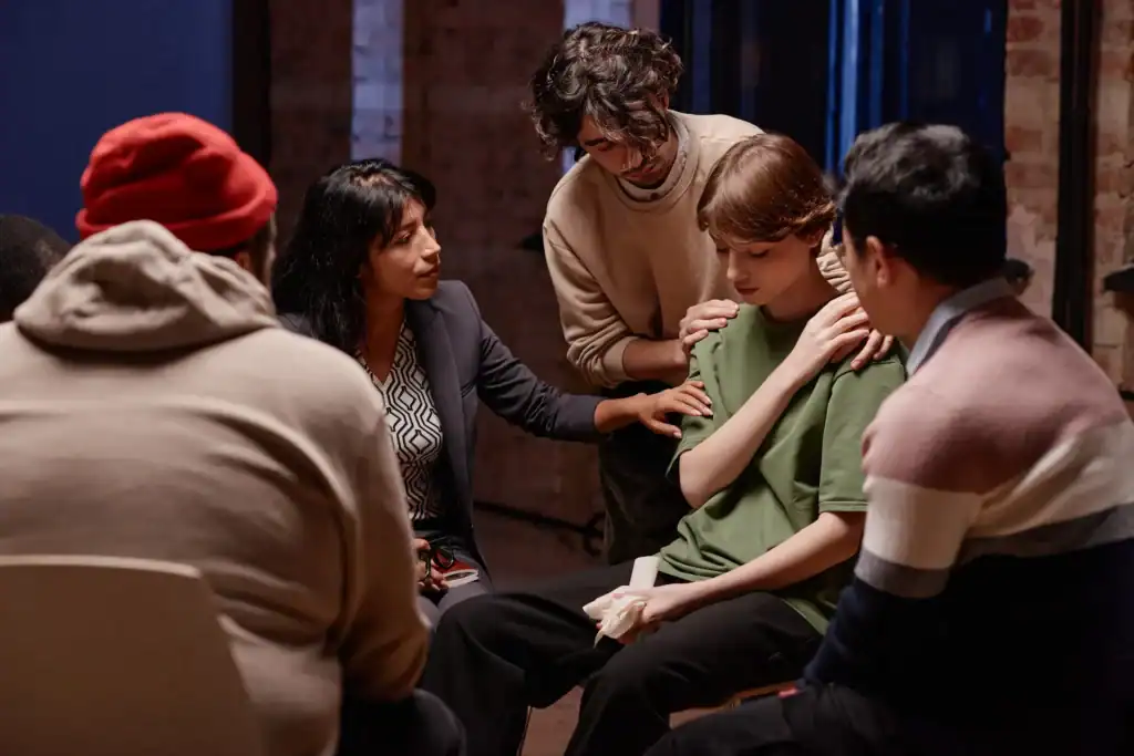 Hope Youth Counseling Session with Diverse Group in Indoor Setting.